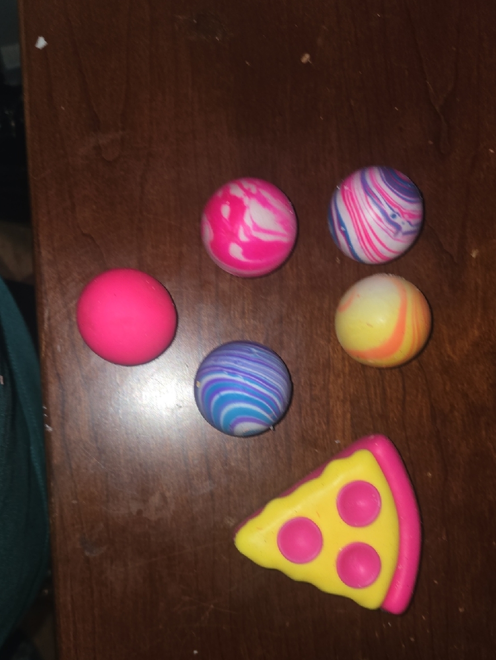 Assorted Pink, Purple & Yellow Bouncy Balls and Pizza Squeezable Toy